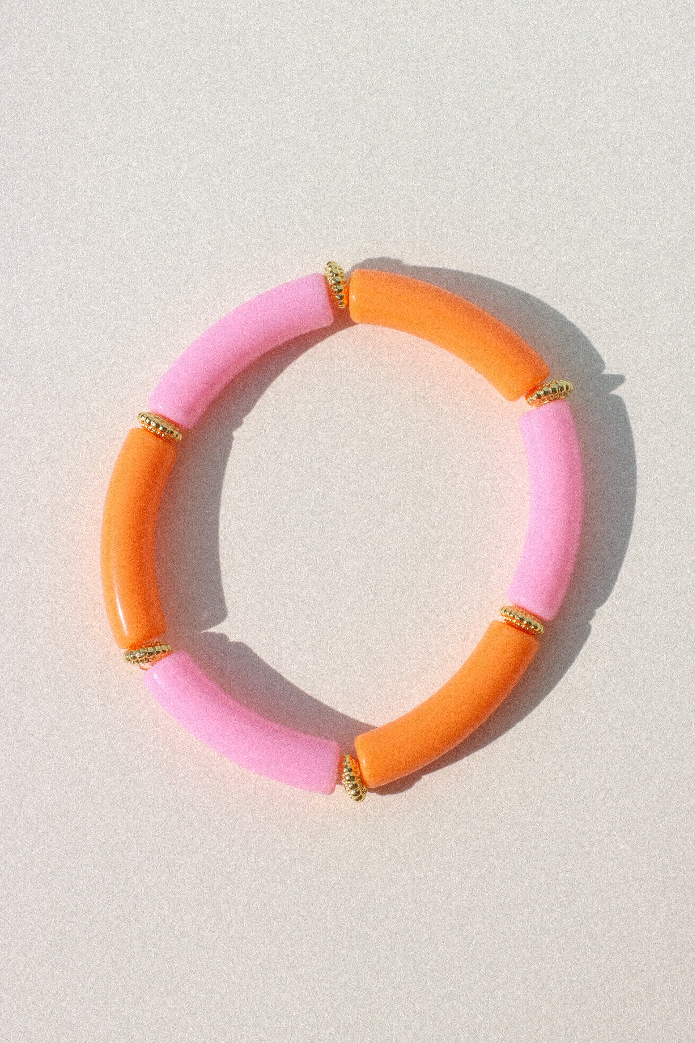 Bora - Bracelet élastique orange et rose à perles tubes